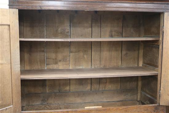 A George II oak press cupboard W.135cm